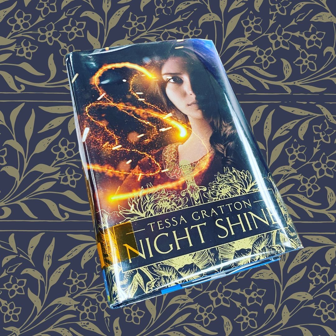 HallLibrary's tweet photo. Night Shine by Tessa Gratton is perfect for fans of Howl’s Moving Castle and Girls of Paper and Fire.
After a crown prince is kidnapped, an orphan named Nothing sets out to rescue him, and discovers all magic is a bargain.
#schoollibrary #queerbooks #yareads #firstsentencefriday https://t.co/fmo237hWiU