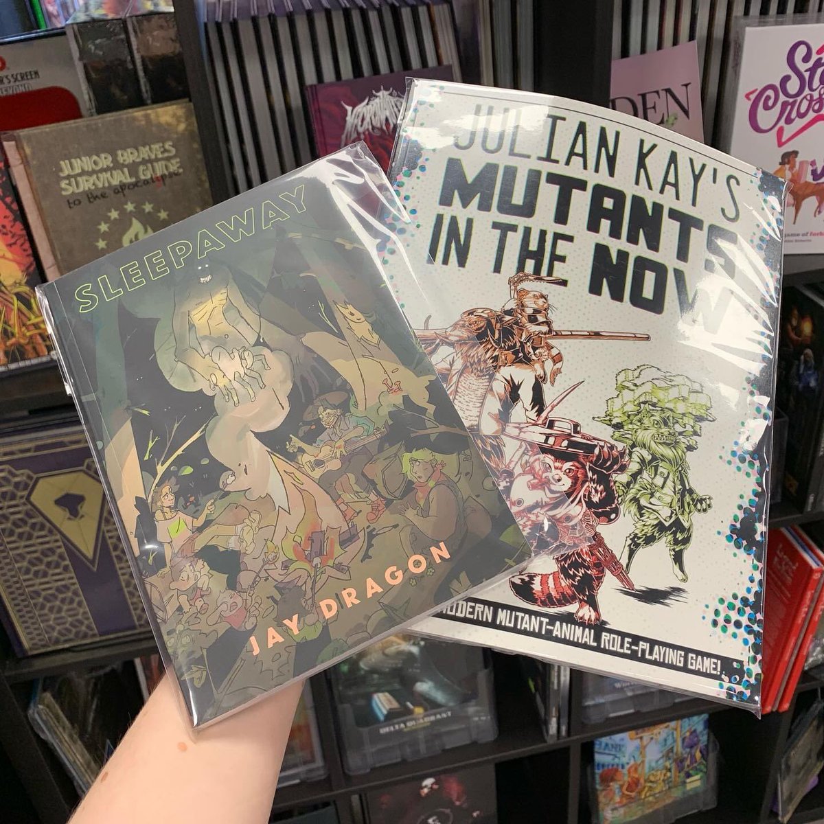 Looking for a new RPG? 👀

Be a Camp Counsellor trying to survive a Summer Camp stalked by a nightmarish creature in Sleepaway by 👻. Or kick-flip villains as a mutant animal in Mutants in the Now. 🐢👊

shop.illusivecomics.com/games/role-pla…

#RPG #indiegame #ghosts