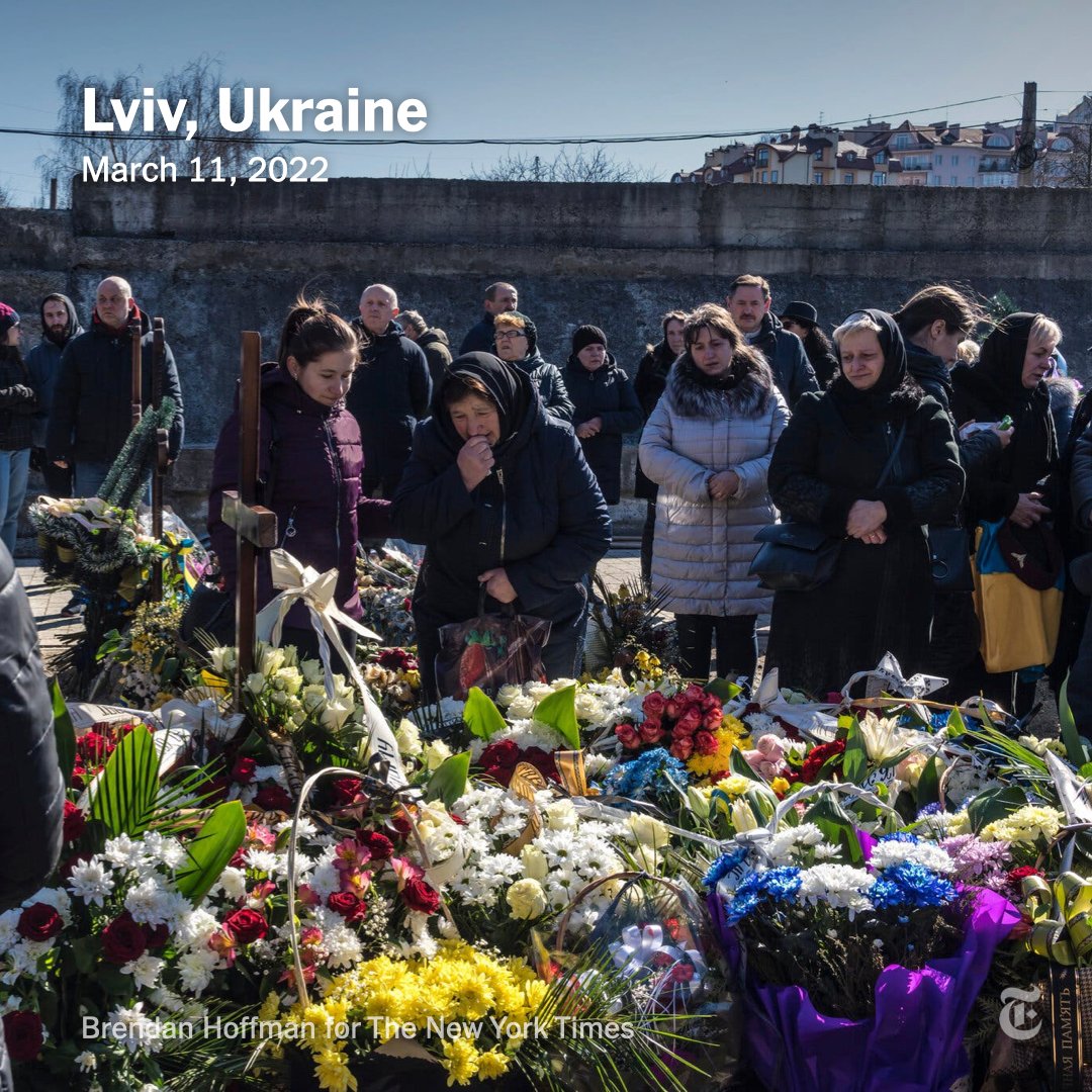 nytimes's tweet photo. Three Ukrainian soldiers killed in combat were buried in Lviv on Friday, as civilian and military casualties keep rising in the war against Russia. Elsewhere, the rumble of heavy artillery fire echoed across Kyiv as Russian forces renewed their offensive. https://t.co/2i2h1FmDkP https://t.co/lpGj4bg5fc
