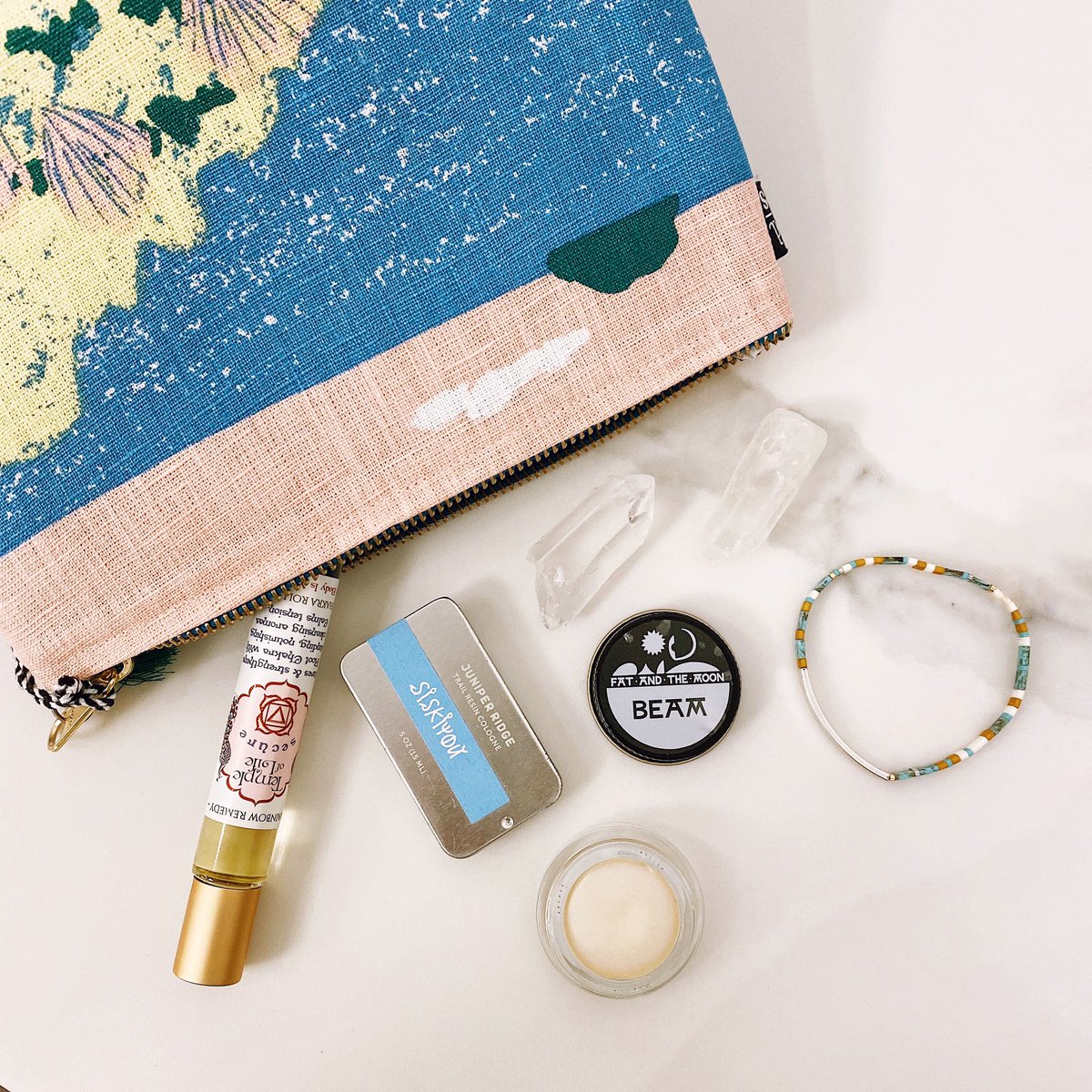 TokenToronto's tweet photo. What’s in your cosmetic bag? 💄
In our Danica cosmetic bag we have Temple of Life chakra roll-on, Juniper Ridge cologne, Fat &amp; The Moon Beam highlighter, quartz and Scout curated wears bracelet https://t.co/RAMP3QGQpN