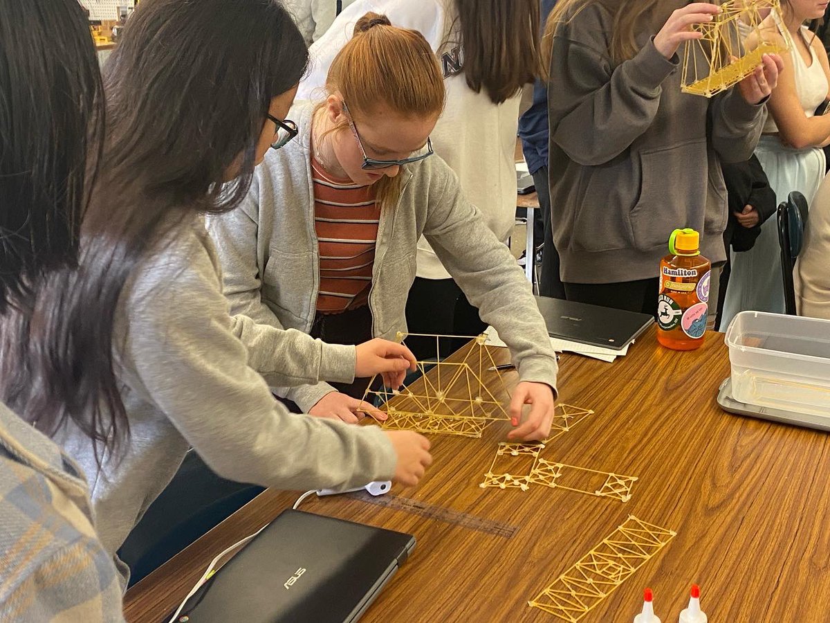 TyngsboroughPS's tweet image. Happy Friday TPS! Mr. Bellerose 8th grade STEM class today testing how much weight each groups spaghetti bridges can hold! Each bridge is made only from different types of pasta and hot glue. Great job to all groups. #tpsprepares #stemeducation