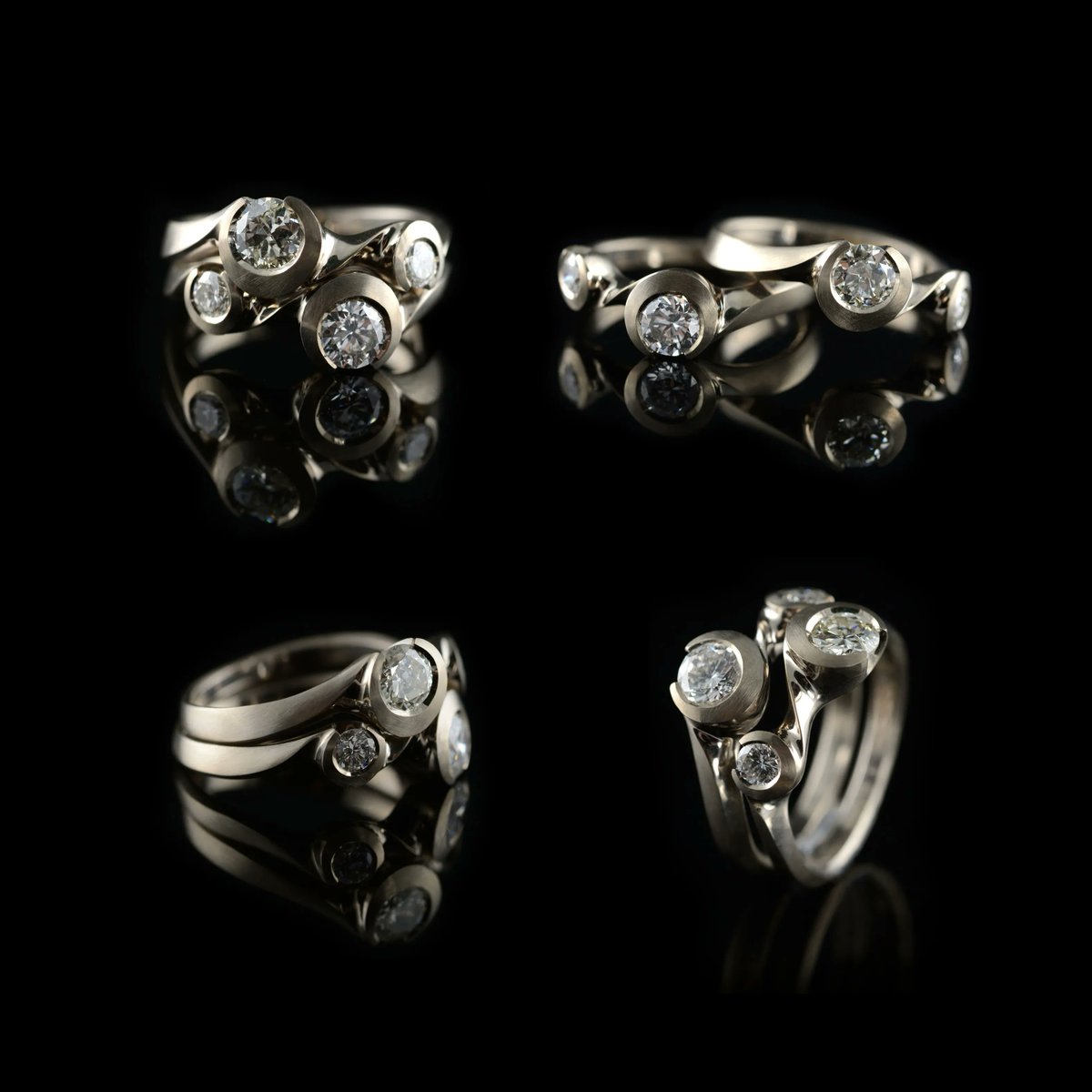 McCaulJewellery's tweet photo. A look back at this lovely Arris commission...carved in wax and set in 18ct white gold, these two rings are made so that they can be worn together or apart.

#bespokejewellery #designermaker #craftsmanship #oneofakind #uniqueengagementring #goldsmithing #engagementringdesign https://t.co/Y6aNGR7mkW