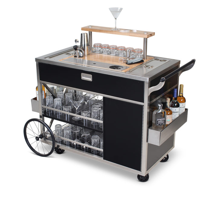 Shown here is our Santa Fe Mixology Cart which features a vintage look with a distinctive X-frame design, flute push handle, and two bicycle wheels. The decorative fluted push handle is the icing on the cake that really makes this cart stand out.