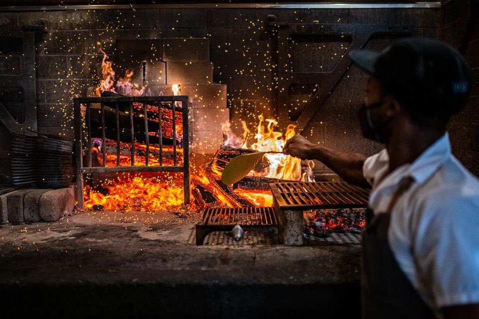 The centerpiece of our open kitchen is our wood-burning hearth, constantly inspiring us to showcase local versatility while staying true to classic cooking methods.