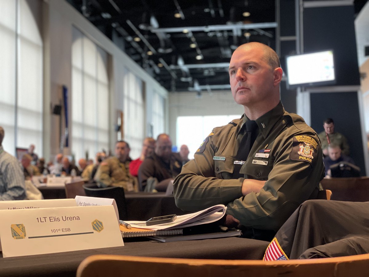 NYSDEC's tweet photo. Capt. Ver Hague, Lt. Thomas, Lt. Ward Jr., Officer Mathis and Dispatchers Pugsley and Catalano represented DEC's Division of Law Enforcement at the #Cyberimpact22 event alongside numerous law enforcement, first responders and private sector agencies. https://t.co/Ci2lRG0ewP