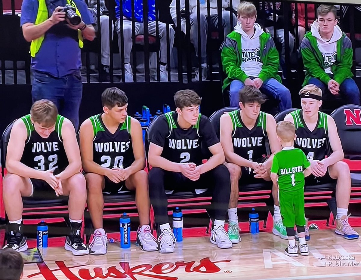 <a href="/drewbilleter/">Drew Billeter</a> “Coach” Billeter gives final pregame pep talk to the starting 5!!   🗣 🏀
Not the ending the future coach hoped for, but fun team to watch. Love how the seniors intently watch him……Great memories!!  Go Wolves!