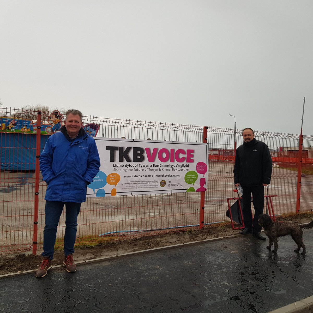 TkbVoice's tweet photo. Come rain or shine the dynamic #TeamTKB is active! Our two last banners are now on display ready for visitors and locals for tomorrow's market @TirPrince & ready for children, parents and teachers coming to school on Monday @MaesOwen @YForyd https://t.co/a6HIIGcEmd