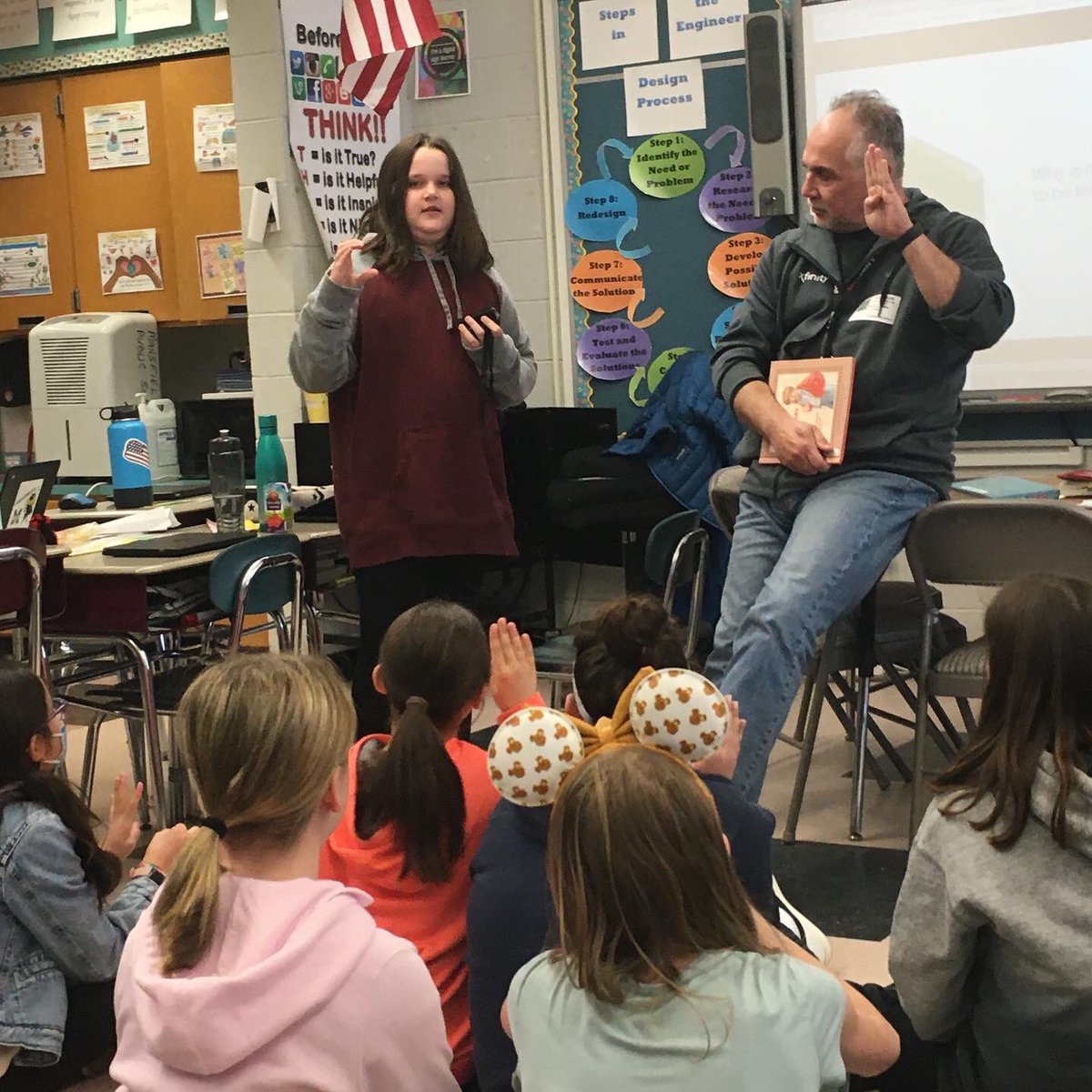 rlfreedm's tweet photo. Today the #jjsecretagents had special guest former #agent10 father to read to us for the I Care program. We read and discussed a story about a child who is hearing impaired. Then #agent3 taught us sign language. https://t.co/4oEwGnezv1