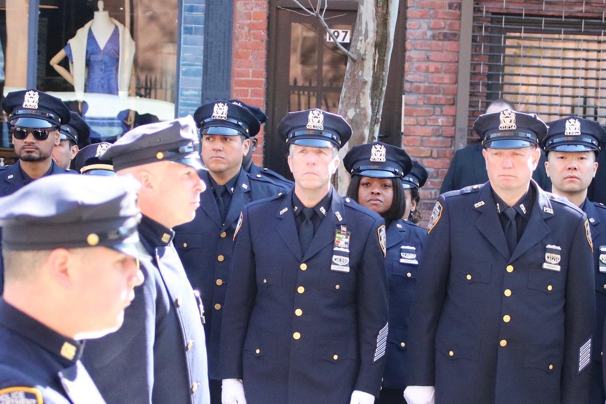 NYCPBA's tweet photo. New York City police officers once again lined a Brooklyn street this morning to salute our fallen brother, Firearms &amp; Tactics Section P.O. David Mathura, as he takes his final post. Rest easy, brother. #FidelisAdMortem https://t.co/raZ6mFdiCI