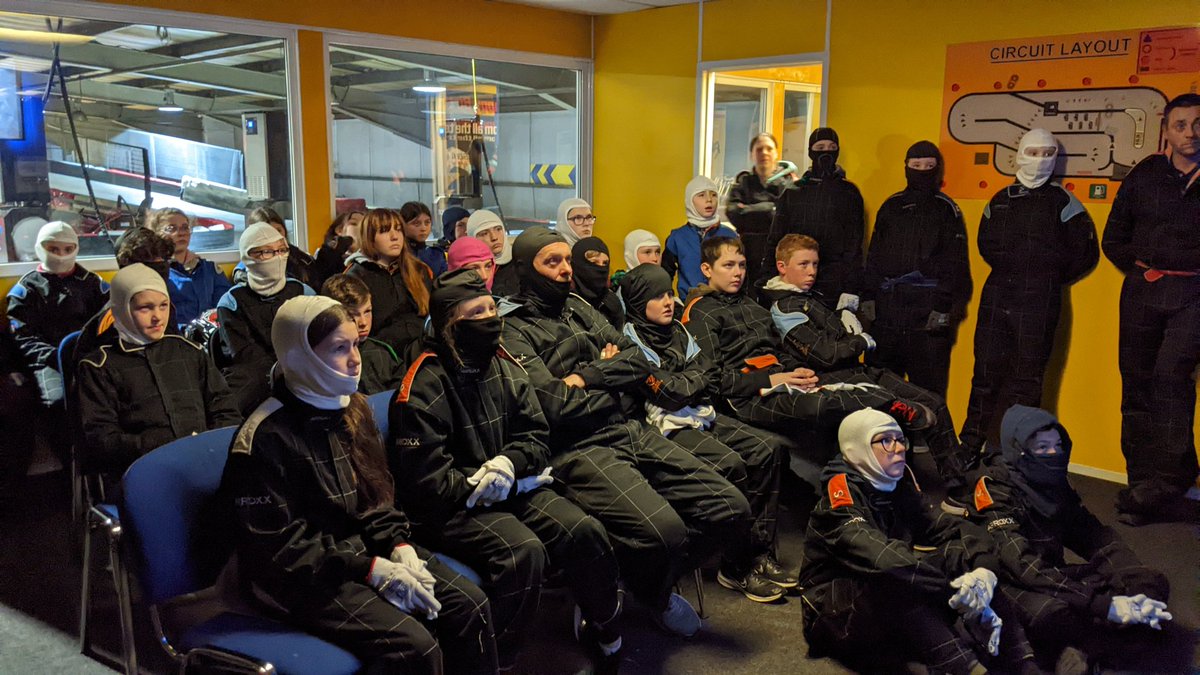 43 Scouts and leaders getting ready for karting.