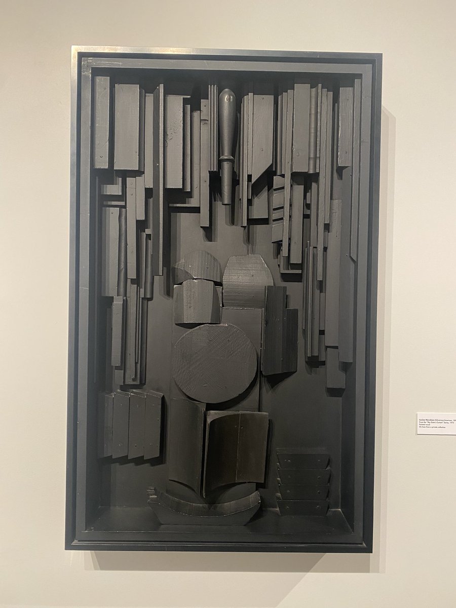 ally22t's tweet photo. I would like to take a moment to celebrate this Ukrainian-American artist Louise Nevelson. This piece, “Sky Gate’s Curtain” (1973) has so much dimension even though it’s painted completely black, which can often make works look flat. It reminds me of organ pipes also. https://t.co/w0rTlKnaIR