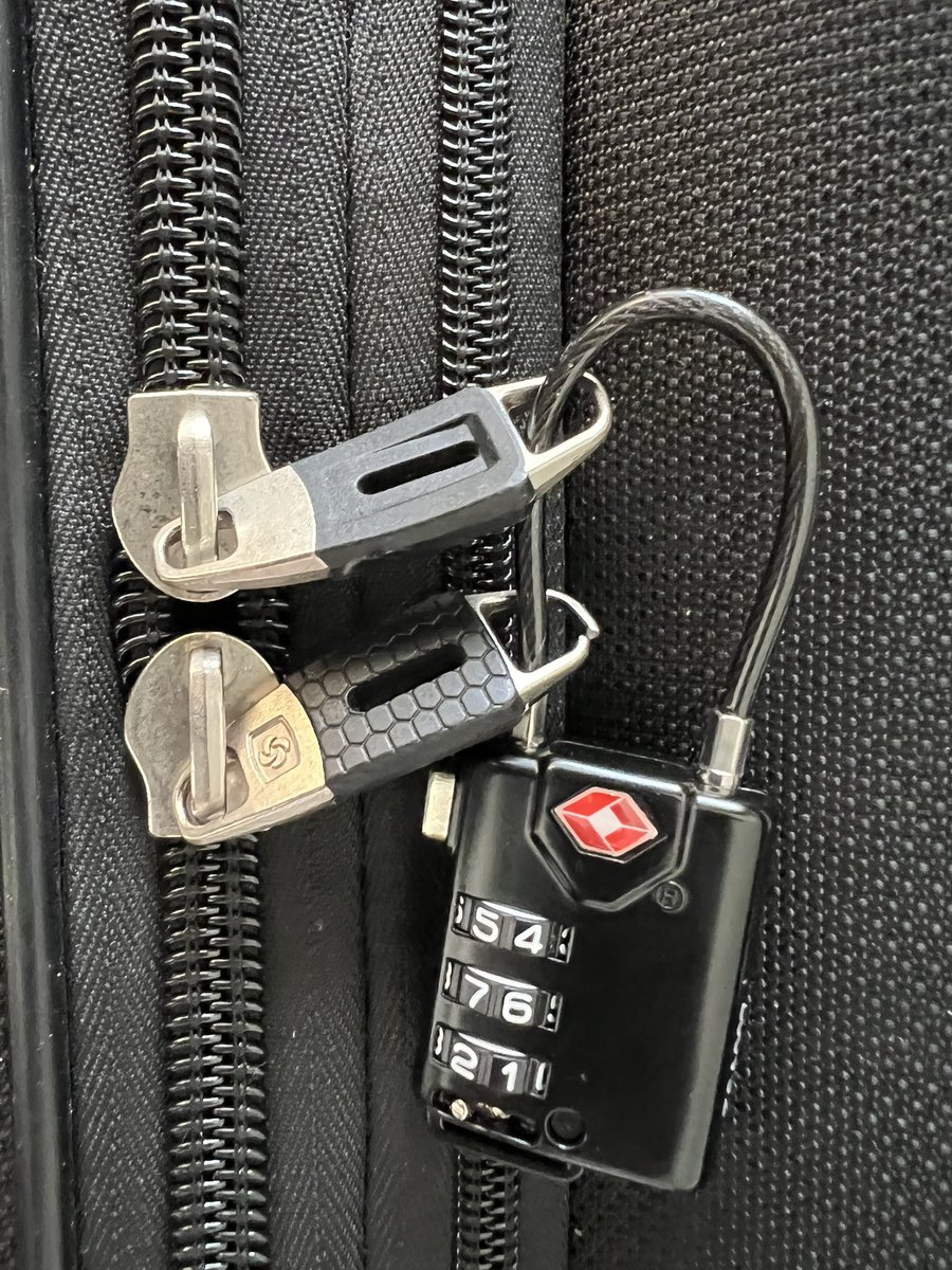 cwojcik's tweet photo. @British_Airways somebody has cut through the zipper endings on my checked luggage despite the fact we had a TSA compliant lock.  booking reference NKG9VT. I https://t.co/odfK0Bp04H