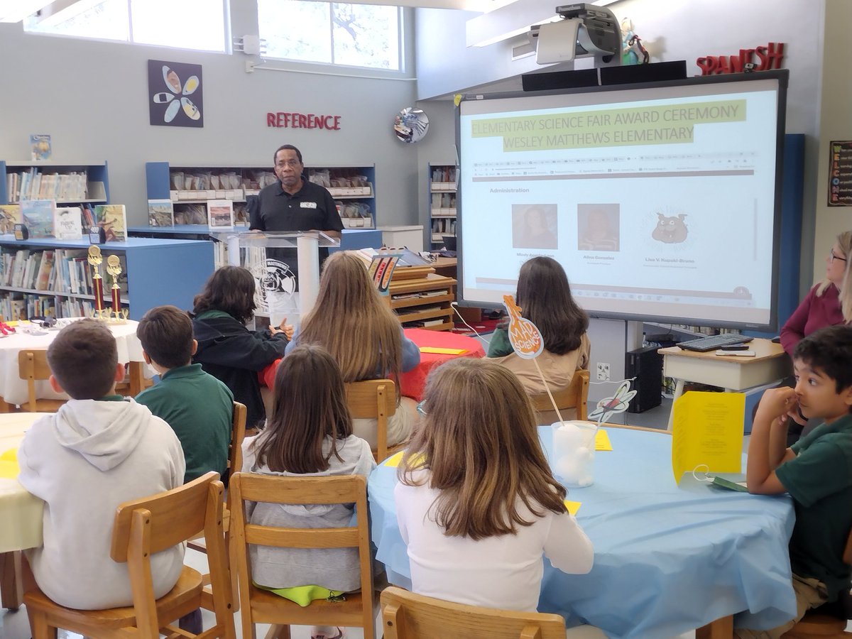M_Lightburn's tweet photo. Yesterday I was invited to attend the STEAM Award Ceremony at Wesley Matthews Elementary. I had the privilege of awarding the Edison Lightburn Science Fair Trophy to Isaac Benzaquen for achieving 1st place in Engineering at the 2022 Elementary Science Fair. https://t.co/Oyh4heLqe3