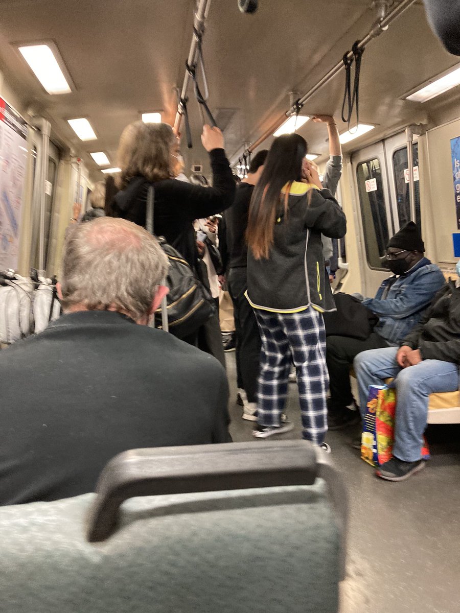 TheaSelby's tweet photo. Right now on #BART, with a street performer in the car. #theoldnormal https://t.co/ODFJEGMv4d