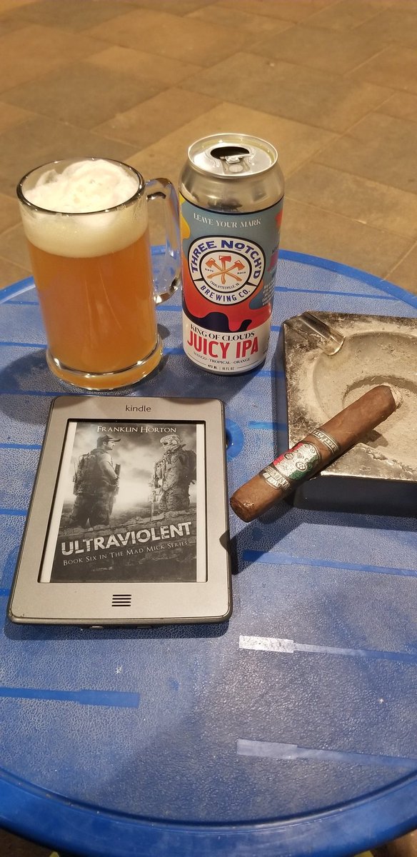 DrewT725's tweet photo. #OnTheBlueTable this evening with; @RockyPatelCigar Flor de San Andres Black Torpedo, @ThreeNotchdBeer King of Clouds Juicy IPA, and Ultraviolent - The Mad Mick book 6 by Franklin Horton. https://t.co/TSZ1O8HylN