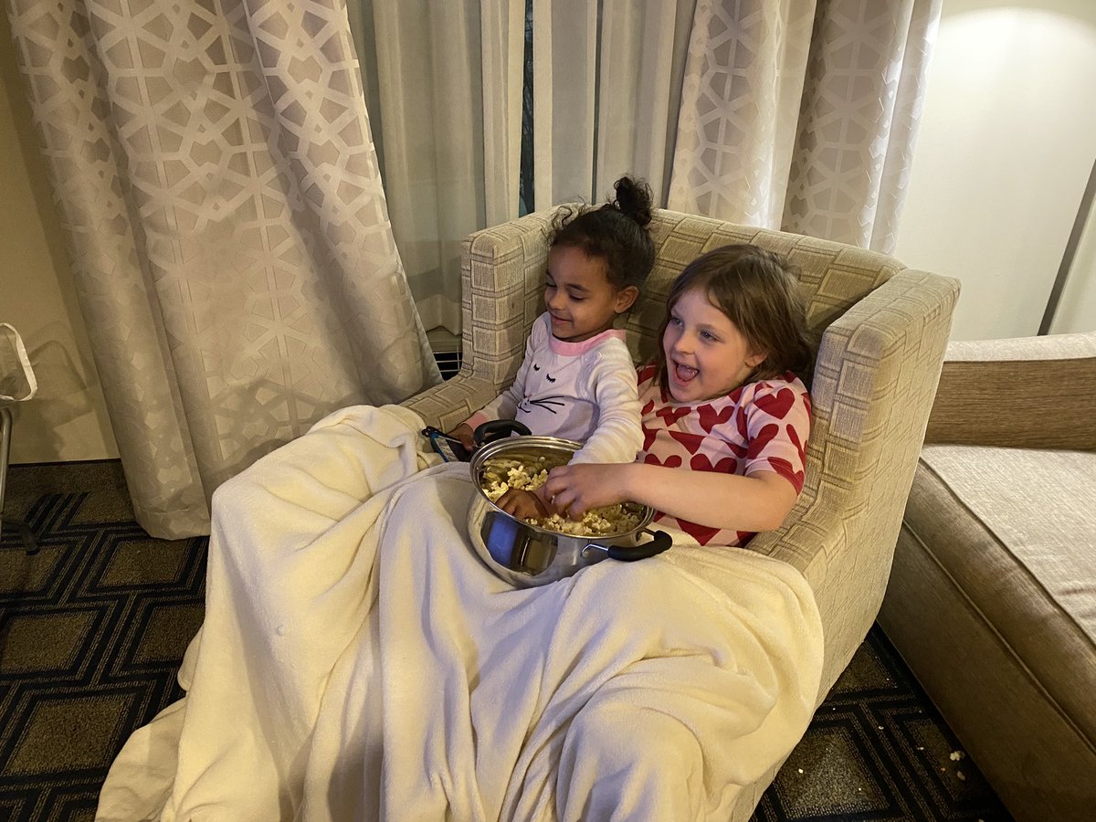 When you are 5 and 7, happiness on vacation is an indoor pool, a bowl of popcorn and a favorite tv show. #grandcanyonspringbreak