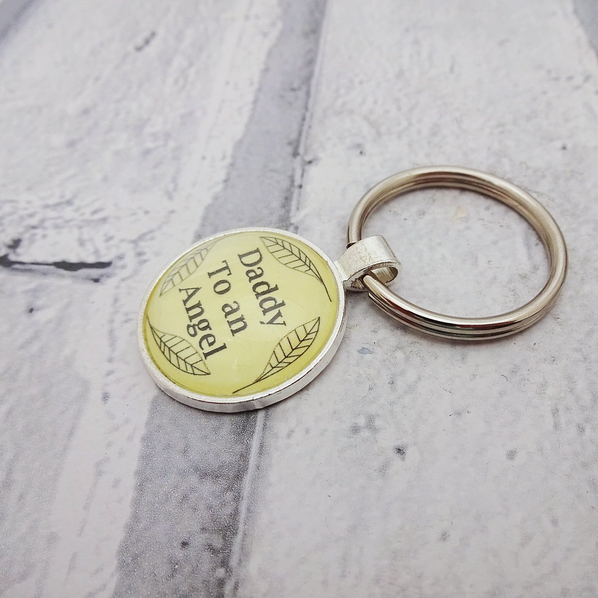 martisanne's tweet photo. Daddy to an angel keyring, baby loss keychain, miscarriage jewelry, angel jewelry, memorial gift, stillbirth, sympathy gift, keepsake, B1 https://t.co/9poBzk7asx #EtsyTeamUnity #TMTinsta #AngelFeather https://t.co/RhKdZc3mgN