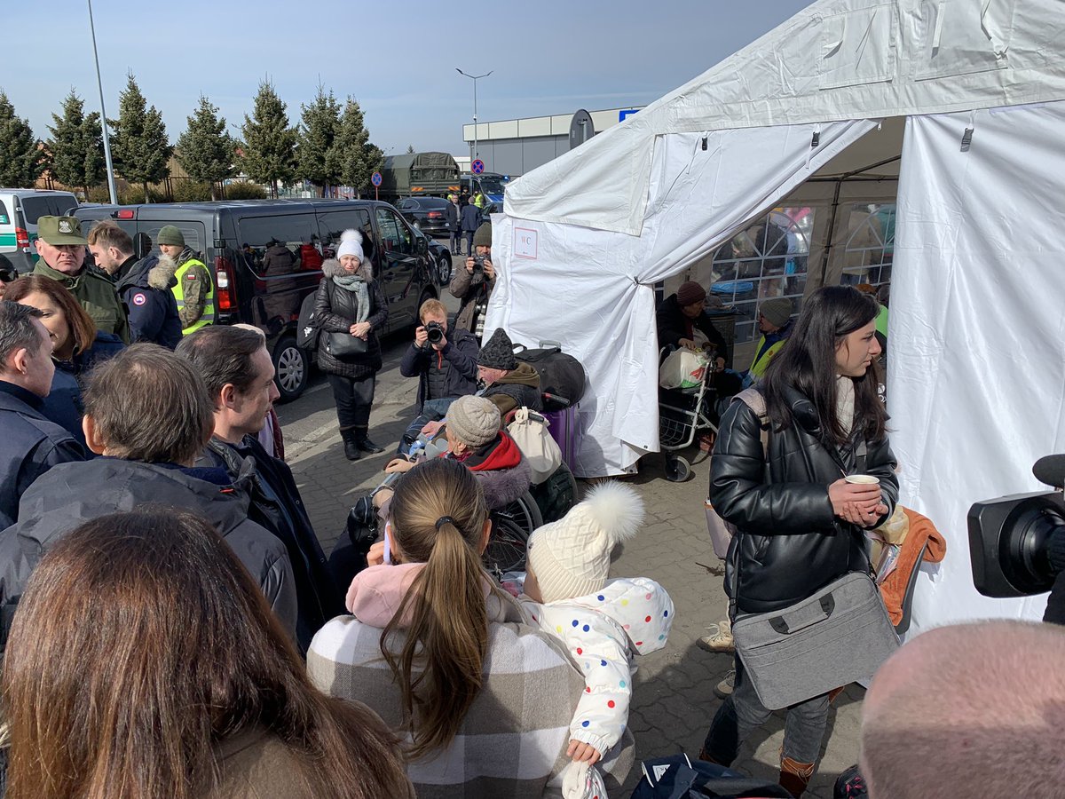 EUAmbSchmidt's tweet photo. At the Polish-Ukraine border crossing at Korczowa this morning. A warm, well-organised reception into the #EU 🇺🇦🇪🇺 https://t.co/yKKrQbbqRE