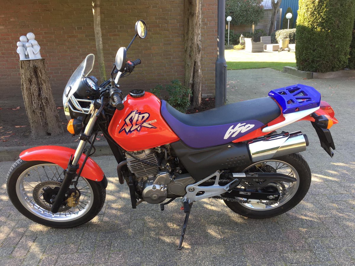 ikzoekeenmotor's tweet photo. Te koop: deze Honda SLR650 uit 1998 met 16.000 echte kilometers! Ideale #startersmotor. Ga naar https://t.co/WwAYXsbUs3 #linkinbio #passievoormotoren #ikzoekeenmotor #motortekoop https://t.co/tTrnA4VVJe