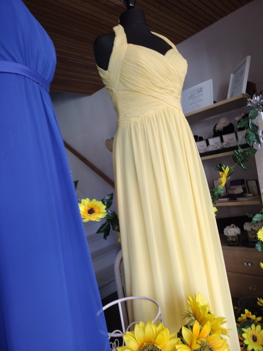 philrandal's tweet photo. My partner @gownsjune 's shop window in solidarity with the Ukrainian people. https://t.co/ujcqOns6h5