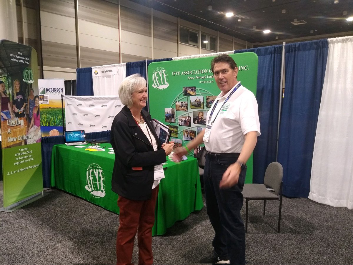 IFYEUSA's tweet photo. #IFYE Board member Russ Mauch (1978 ND to Hungary) visiting with a 2022 Commodity Classic attendee about the IFYE program. We'll be at #classic22 booth 5706, stop on by! @ComClassic #internationalAg #exchange #travel https://t.co/1AxEqDWgy3