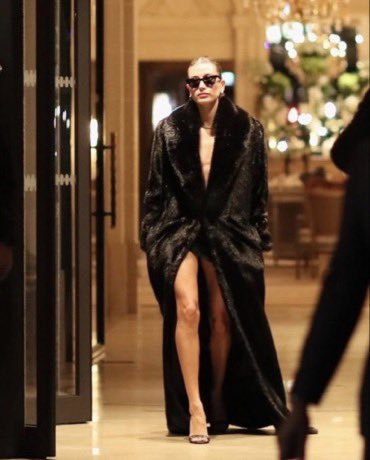 TheBlackGlinda's tweet photo. I might never get over Hailey Bieber wearing this Saint Laurent fur coat https://t.co/boQblvc5v2