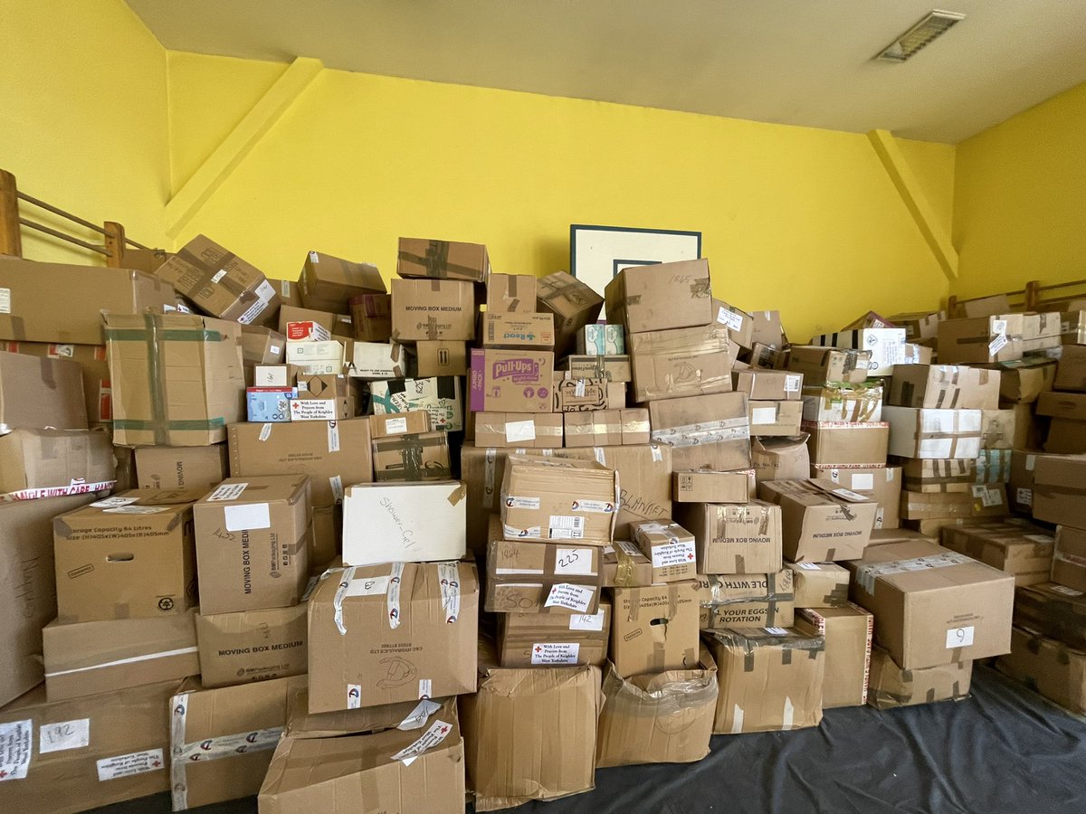 Boxes from two lorries are stacked high in a gym in Lewin Brzeski in Poland. They were donated in Keighley in West Yorkshire and driven here to help Ukrainian refugees <a href="/itvcalendar/">ITV News Calendar</a>