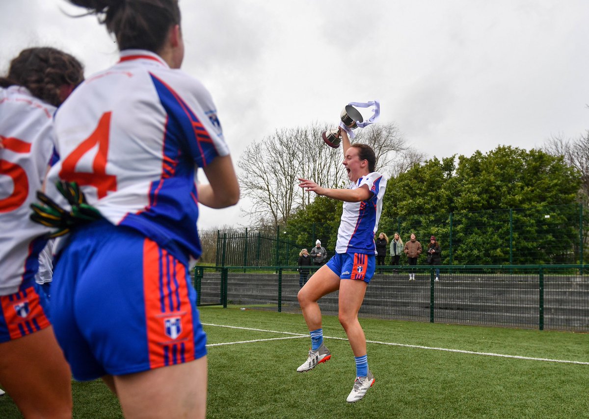 LadiesFootball's tweet photo. 👏 🏆 Áine Keane of Mary Immaculate College lifting the cup after the Yoplait Giles Cup Final match between TU Dublin and Mary Immaculate College! #AlwaysBelieve https://t.co/CoAVxJMbmx