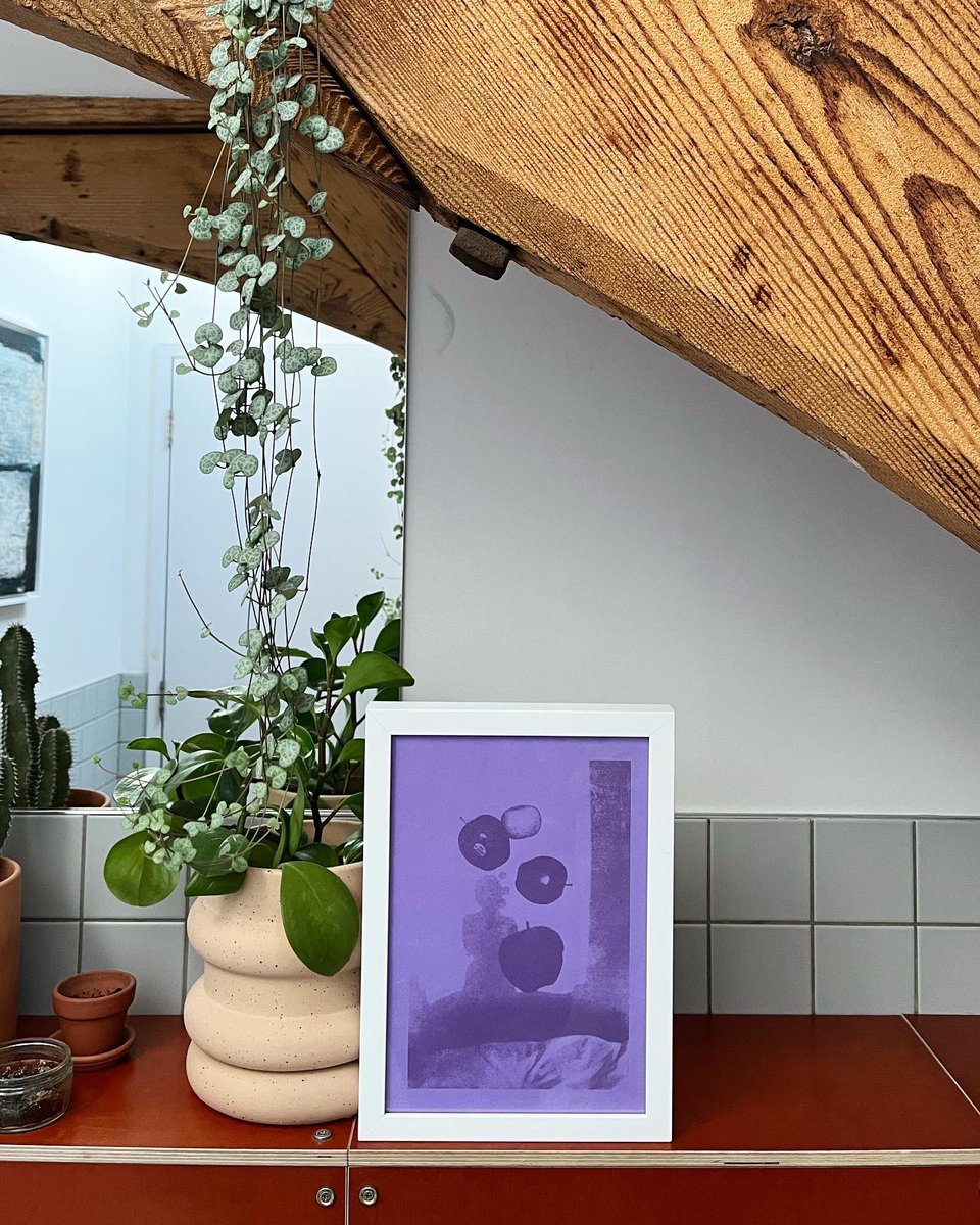 slvmenon's tweet photo. Got 3 apples and an orange for breakfast at the quarantine hotel last year, took a photo of it cos good lighting, got purple paper, screen printed it, got a frame for it, took it to the upstairs bathroom cos good lighting, took a photo of it. 
#print #apple #orange https://t.co/9cR2cMbzVT