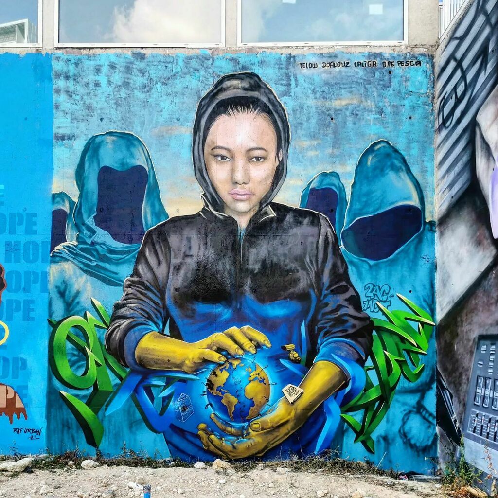 @yelow_paint <a href="/djalouz/">djalouz</a> @caligr_one and @onepesca #mural for @spot__13 #paris #france
#urbanart #streetart #yelow #djalouz #caligr #onepesca #woman #portrait #face #character #colorful #letters #lettering #spray #spraypaint #painting #earth #spot13 #associ… instagr.am/p/CbA4vCFgAbO/