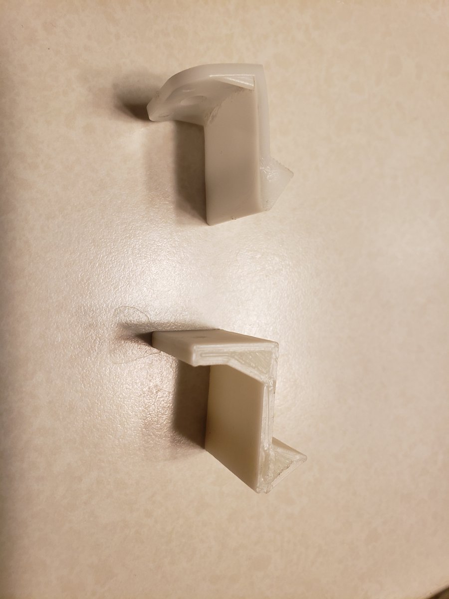 KeyboardError's tweet image. Broke a clip that holds on a cabinet front. 20 minutes in #TinkerCAD later, I have a new clip. #3dprinting at it's finest.