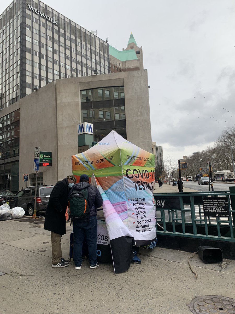 3:49pm LabWorQ tent Court and Montague 2 people waiting for a test.