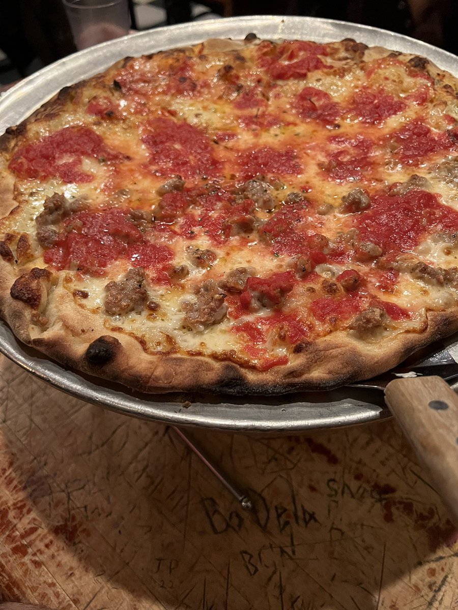 BlueLobsterPow's tweet photo. One bite everybody knows the rules @stoolpresidente ๐ #johnsofbleecker #pizza #NYC https://t.co/l2VzkZ6gUM