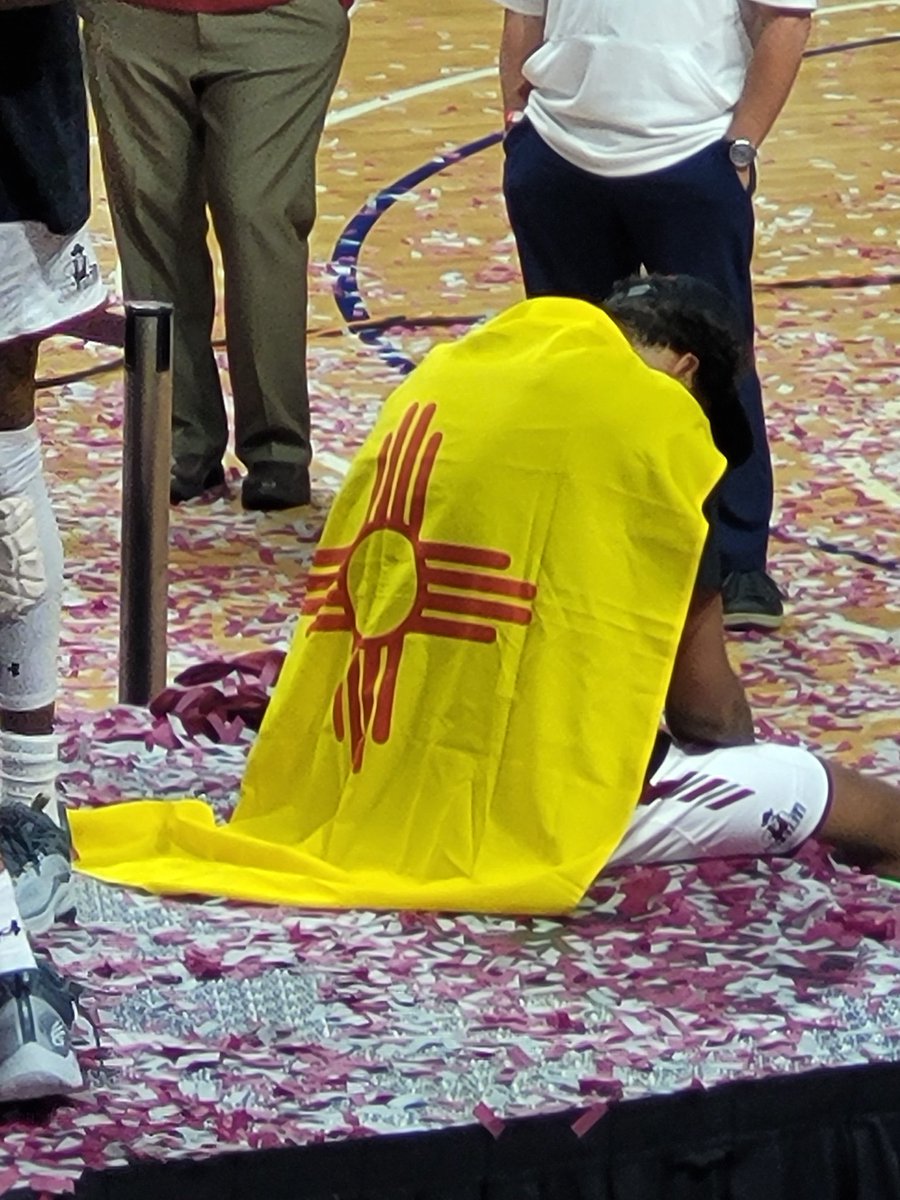 encinias1's tweet photo. Johnny w my NM Flag. It's  what I do. So proud of him and our Aggies!  @NMStateMBB 
@stephenwag22 
@mccantsjohnny23 
@WACHoopsDigest 
@JoeGarza_14 
@ColinDeaverTV https://t.co/DPNnogD68k