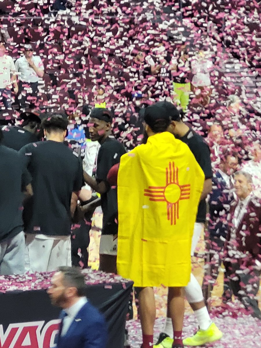 encinias1's tweet photo. Johnny w my NM Flag. It's  what I do. So proud of him and our Aggies!  @NMStateMBB 
@stephenwag22 
@mccantsjohnny23 
@WACHoopsDigest 
@JoeGarza_14 
@ColinDeaverTV https://t.co/DPNnogD68k