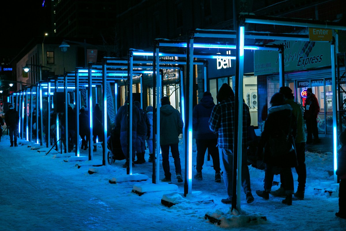 Walking through the lights at #fireandice2022 @downtownbank <a href="/exarstudios/">EXAR Studios</a> <a href="/apt613/">Apartment613</a> <a href="/ottawa_tourism/">Ottawa Tourism</a> #ottawa #photography #ottarts