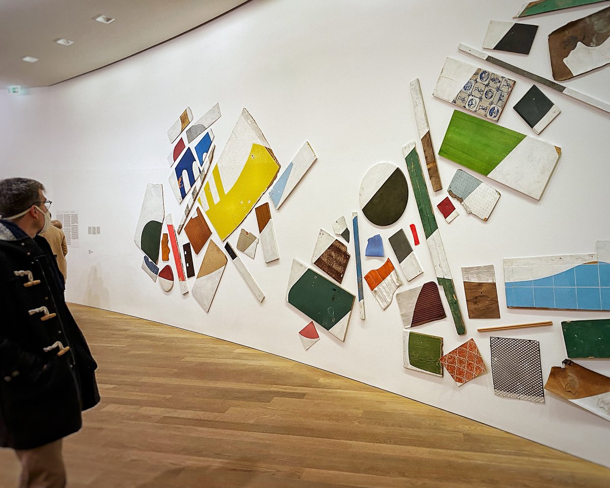 mudamlux's tweet photo. The sculptural mural, "Dining Motions" by #TonyCragg, can be seen as an extensive painting assembled from found objects. From this collage an image of a meal appears comprising a fork, a sausage and a knife.
Currently on show in the exhibition "25 years of the #MudamCollection" https://t.co/m7E9gL6QrA