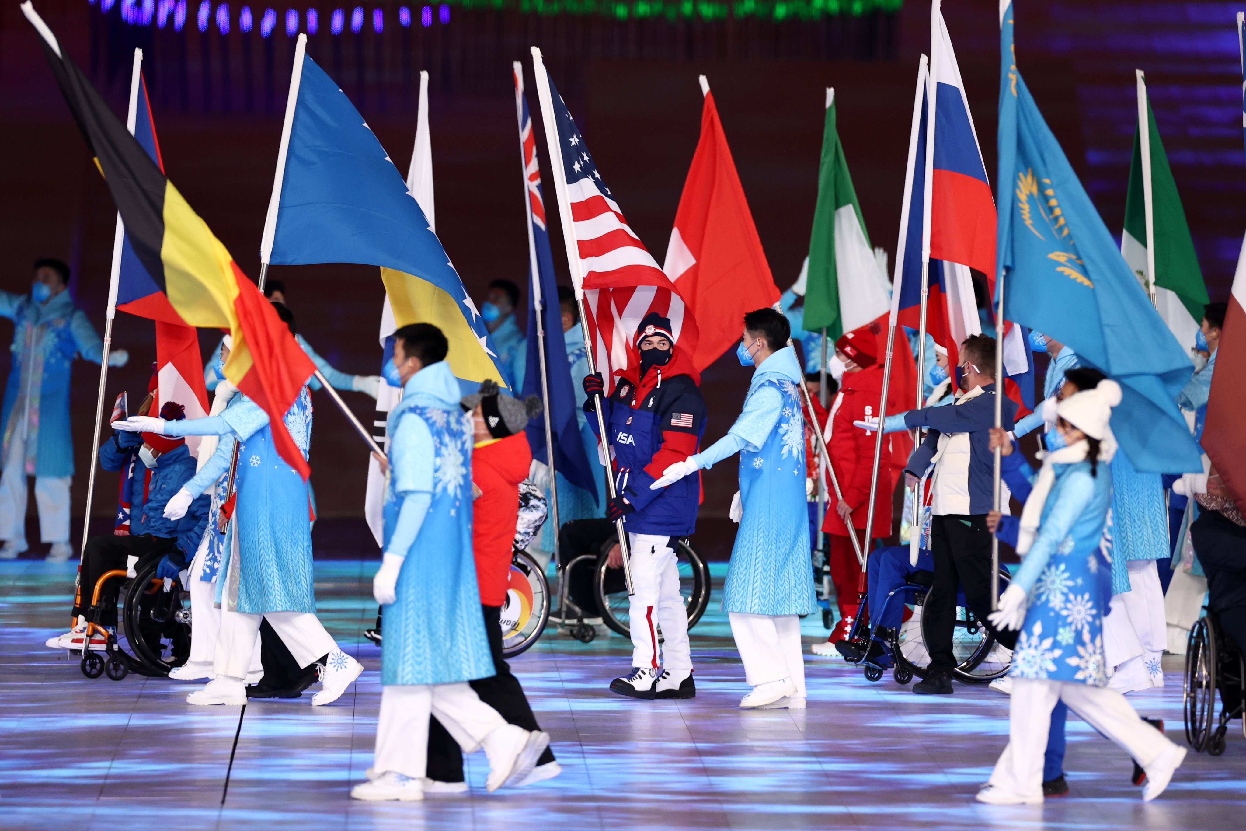  Flag bearer Keith Gabel of Team United States of America waves their countries flag during the Closing Ceremony on day nine of the 2022 Beijing Winter Paralympics