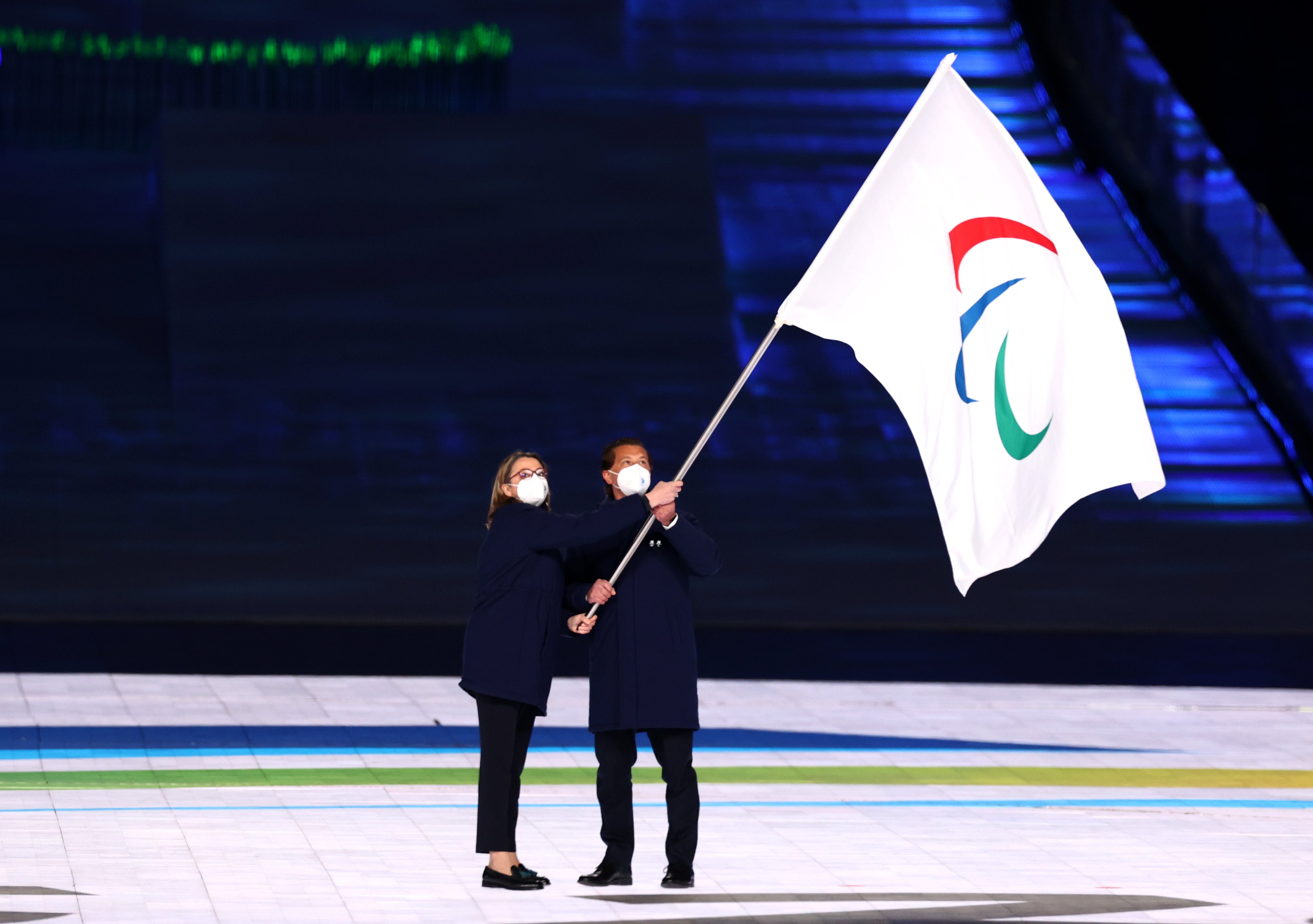 The Paralympic flag is handed over to Milan, the next hosts of the games during the Closing Ceremony