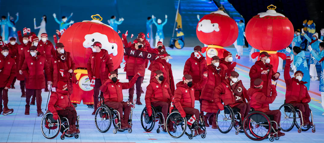 Team Canada and shuey rhon rhon mascot