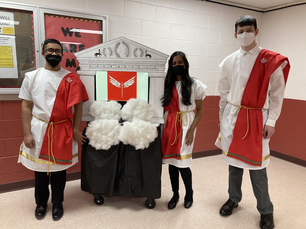 Our Chairman’s team is dressed in Greek attire in honor of our robot, Iris, named after the Greek goddess of the rainbow and messenger of the gods.