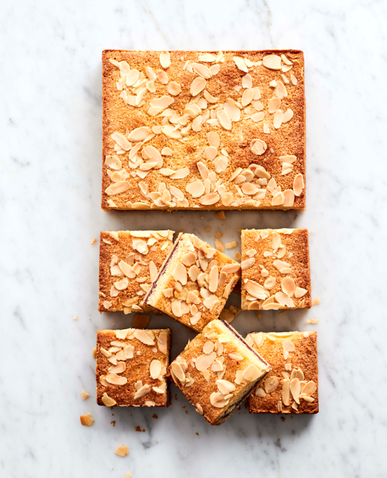 tbf_bread's tweet photo. The British classic: shortcrust base of ground 
almonds spread with raspberry jam, topped 
with a layer of soft almond sponge and 
toasted flaked almonds.

#sweet #cake #thebreadfactory #bakerylondon #bakeries #londonfood #bakewell #traybakes https://t.co/EP6WHvRkYF