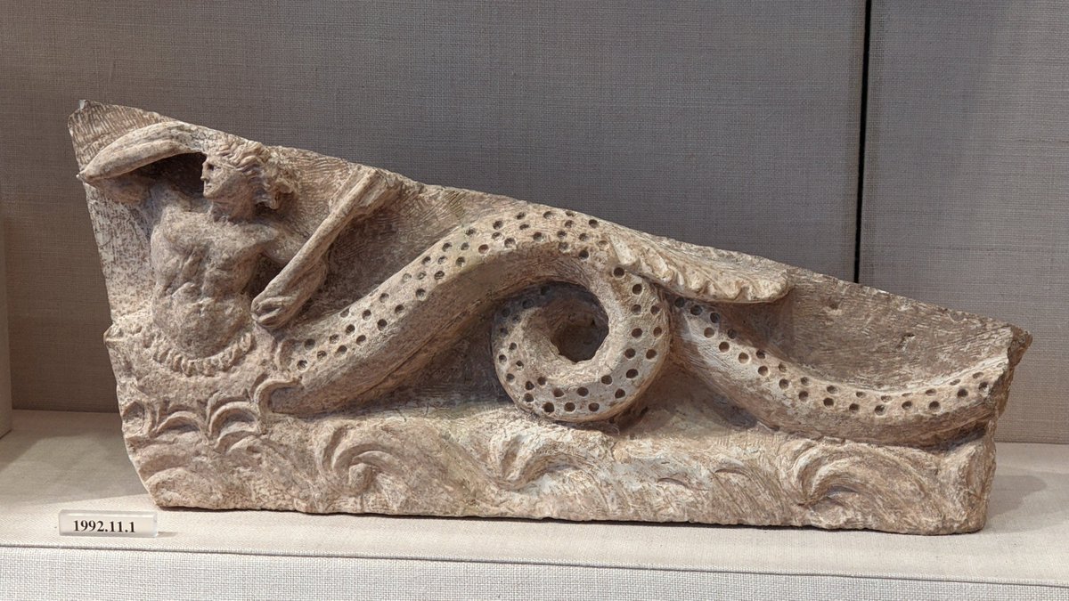 ElhoimLeafar's tweet photo. A limestone fragment, Greek, ca, 300 B.C.
This fragment belongs to a funerary monument, showing a hippocamp (male sea monster) holding a rudder and a shield. @metmuseum #metmuseum #naiskos #merman https://t.co/hTJ4PxQwSQ