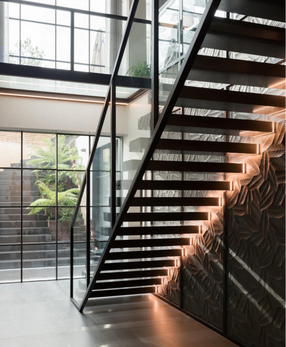 SHHArchitects's tweet photo. SHH Residential- the feature staircase within our North London project, linking the main family living space to the lower ground entertainment areas. The unique stone by Lithos Design defines the staircase and creates movement and interest within the open corridor. #shharchitects https://t.co/zsblUziOC7
