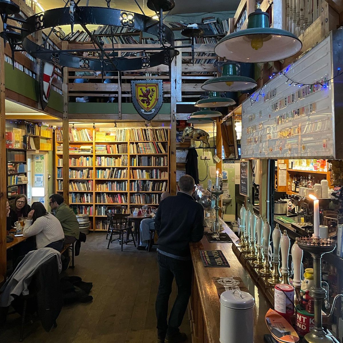 Rob_Fiehn's tweet photo. Pub in a secondhand bookshop in a Grade II listed chapel by the seaside. This has all the ingredients for one very happy Rob. https://t.co/CknX0jG7QG