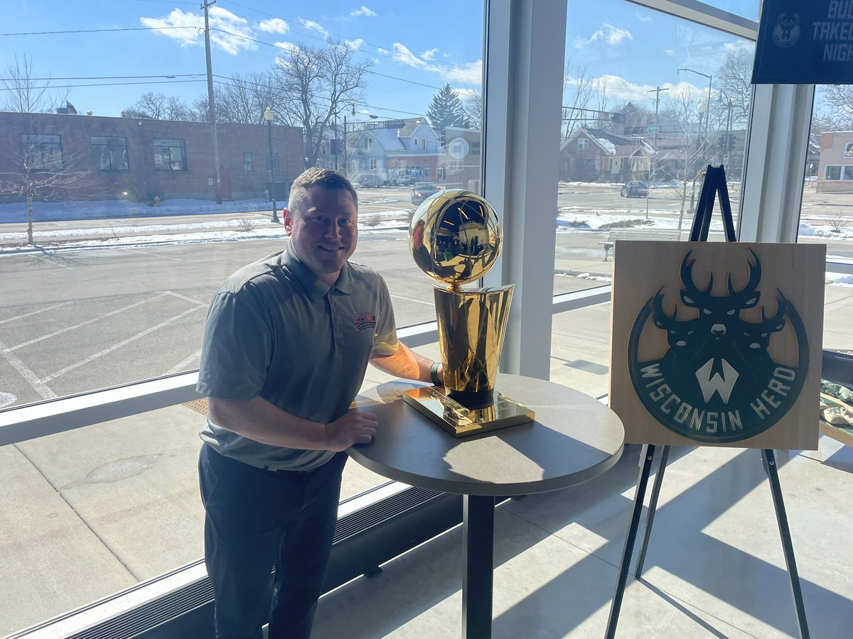 BJ_DeGroot's tweet photo. Sup #LarryB just your causal Sunday posing with the @Bucks #NBA Championship trophy! https://t.co/fh9X1HNVWk