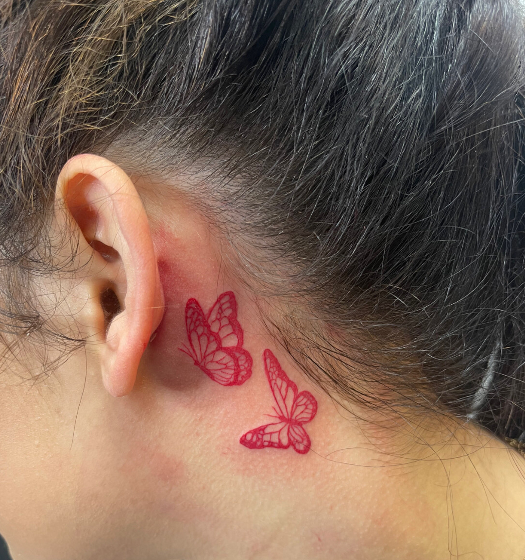 3 Red Butterfly Tattoo Behind Ear: A Symbol of Freedom