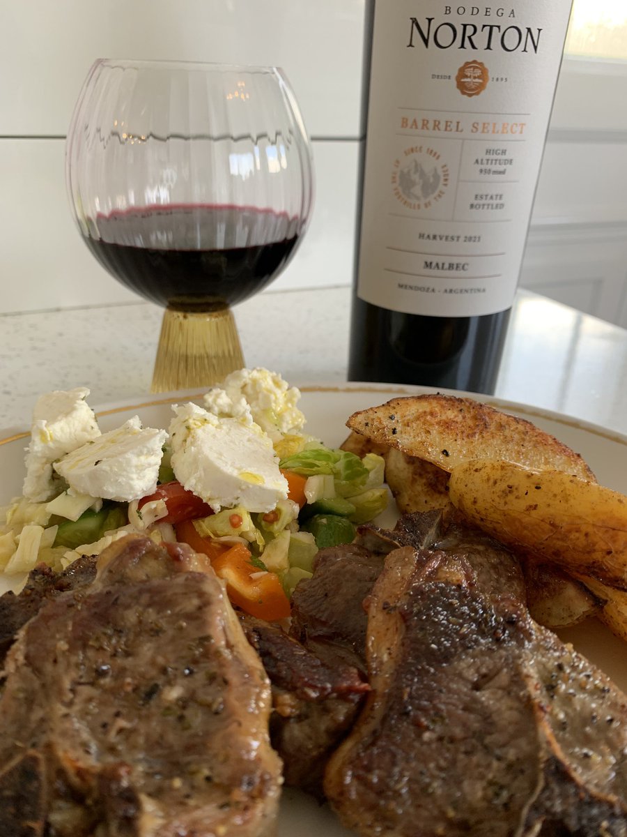 Sunday dinner Scottish lamb chops, salad with feta, harissa spiced wedges paired with barrel aged Argentinian Malbec inky with mellow tannins #ScottishLamb #homecooking #Greekflavours #winepairing #ArgentinianWine #Malbec