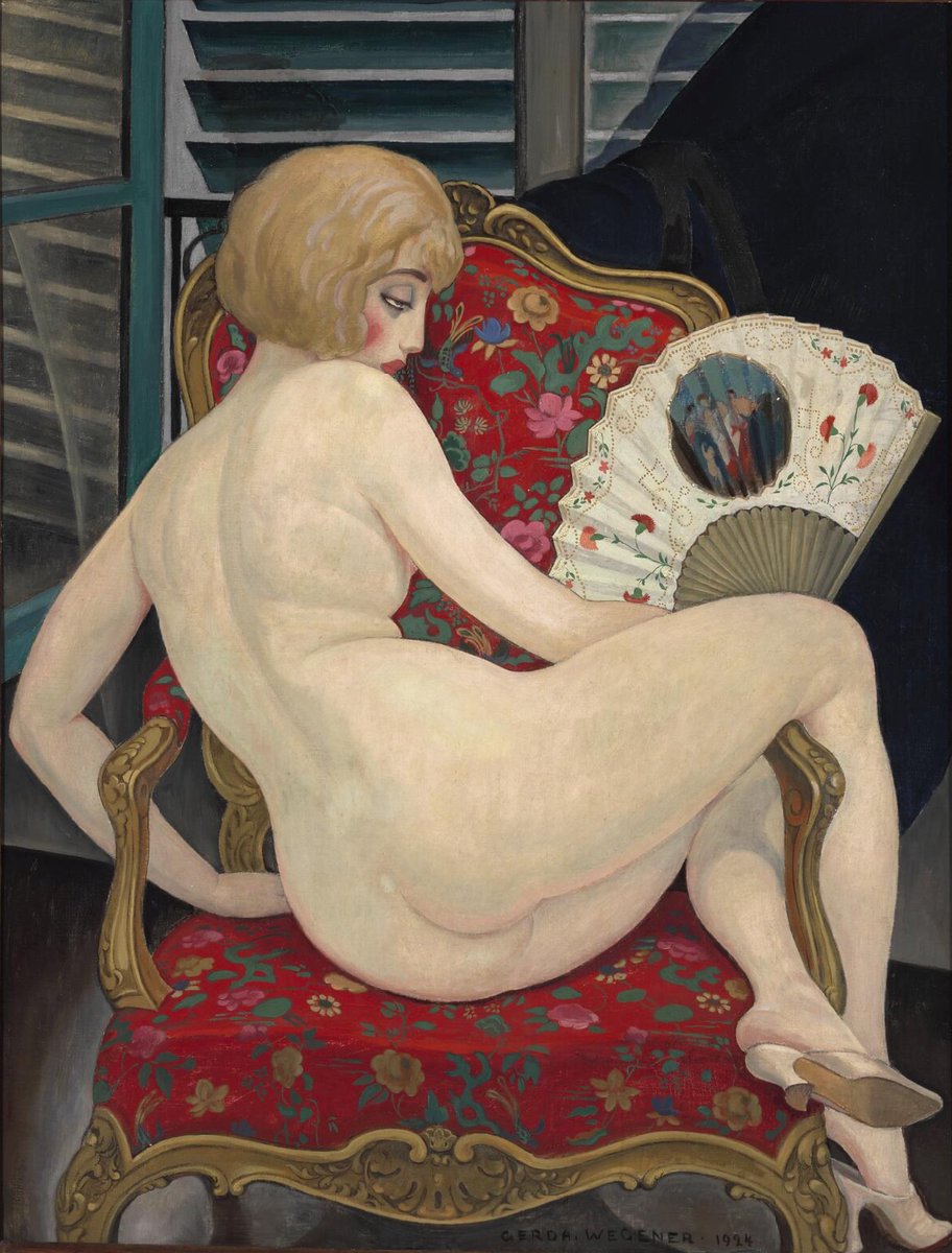 A seductive odalisque with red lips and heavy eyelids. In Gerda Wegener’s portrait we meet Lili Elbe, also known as Einar Wegener, who nearly 100 years ago underwent one of the world’s first gender reassignment surgery.
🎨 In the Heat of Summer (Lili) 1924 #LGBTQ #womensart