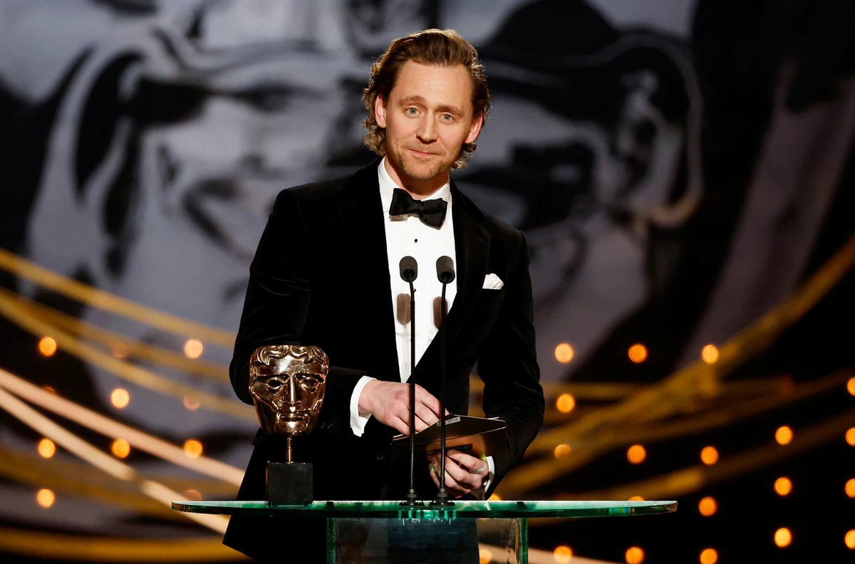 Tom Hiddleston | HiddlesPage (@hiddlespage_) on Twitter photo On stage! Tom Hiddleston at the EE British Academy Film Awards at Royal Albert Hall on March 13, 2022 in London, UK  #EEBAFTAs 
via Torrilla On stage! Tom Hiddleston at the EE British Academy Film Awards at Royal Albert Hall on March 13, 2022 in London, UK  #EEBAFTAs 
via Torrilla